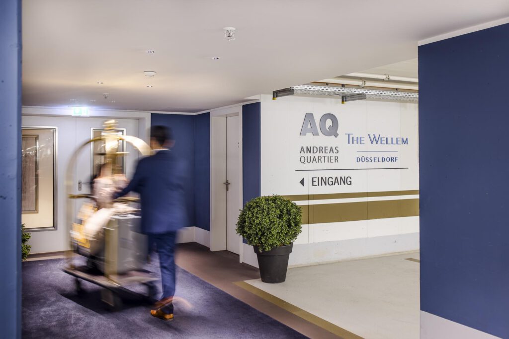 Spacious underground parking garage with valet parking at Hotel The Wellem Düsseldorf